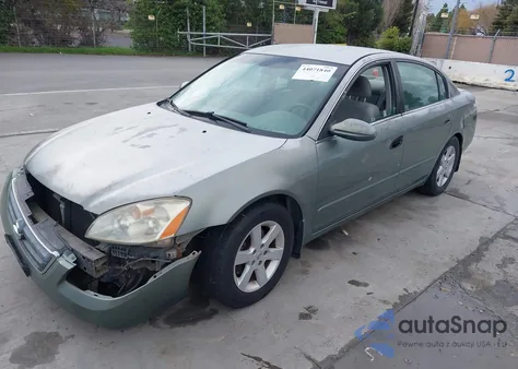 2002 Nissan Altima 2.5 S из США, поврежденный, VIN 1N4AL11D82C197008
